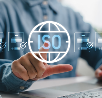 ISO-Certified Quality Systems Person pointing at a digital ISO certification icon, representing quality assurance and compliance standards.
