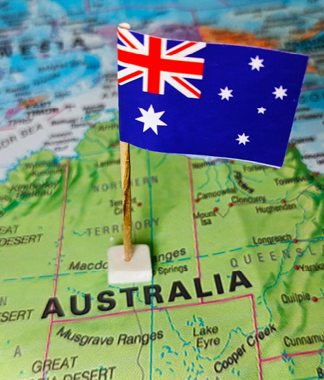 Local Experience and Area-Specific Expertise Small Australian flag pinned on a map of Australia, symbolizing local experience and area-specific expertise.